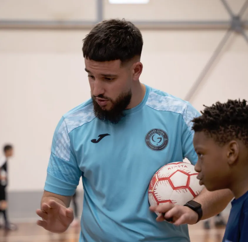 Portrait du fondateur de Next Football Camp en séance avec un joueur